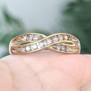 9K solid gold diamond channel set crossover ring